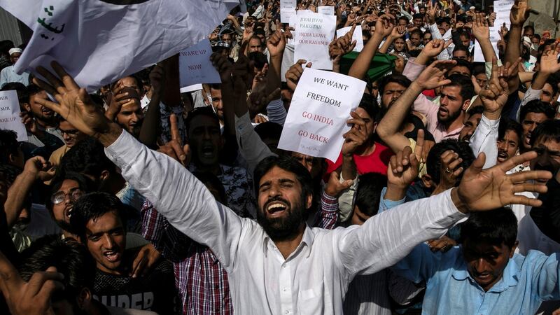 Kashmiris in Srinagar protest after prayers at a mosque: Some 300 political leaders, including two former chief ministers, have been arrested. Photograph: Danish Siddiqui
