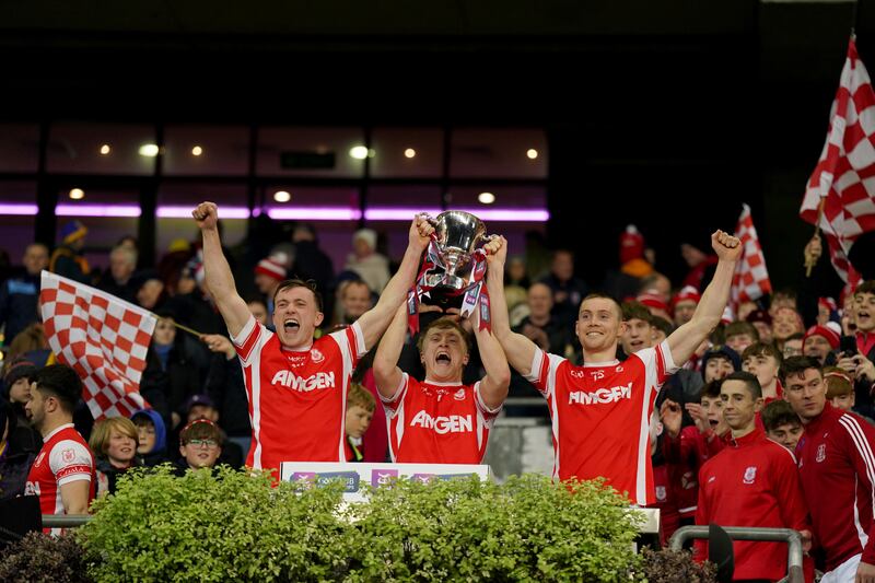 Niall O'Callaghan, Eoghan O'Callaghan and Con O'Callaghan of Cuala celebrate after the Leinster club SFC final win over Ardee St Mary's at Croke Park. Photograph: James Lawlor/Inpho