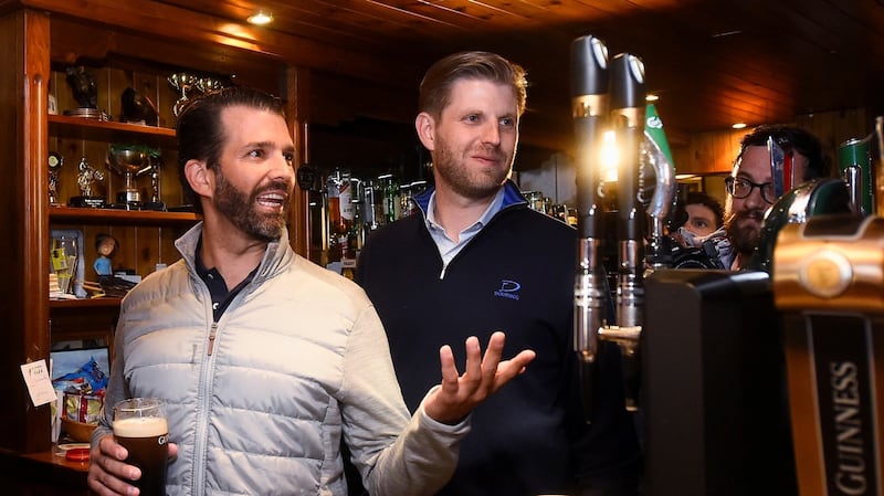 Donald Trump’s sons, Eric and Donald Trump Jr, visit a local pub in Doonbeg village. Phtograph: Reuters/ Clodagh Kilcoyne