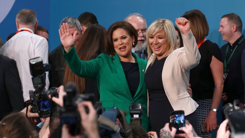 Sinn Féin president Mary Lou McDonald (centre)  with deputy president Michelle O’Neill celebrating after their election at a party  ardfheis at the RDS in Dublin. Photograph: Nick Bradshaw