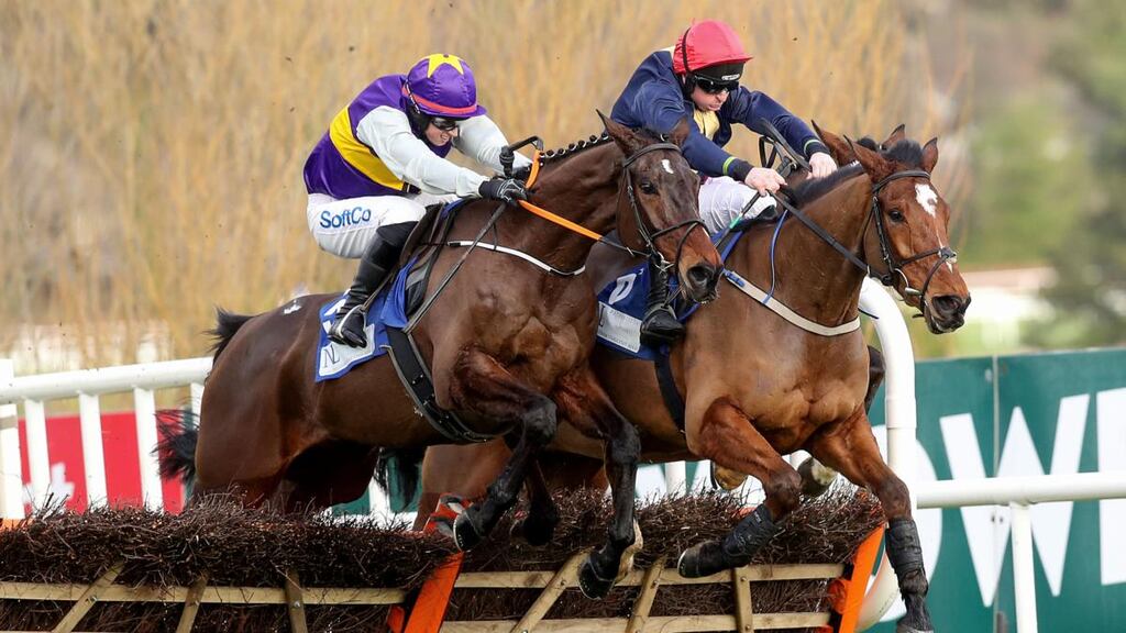 Latest Exhibition ridden by Bryan Cooper (left) is challenged by Longhouse Poet ridden by JJ Codd during the Dublin Racing Festival at Leopardstown. Photograph: Bryan Keane/Inpho