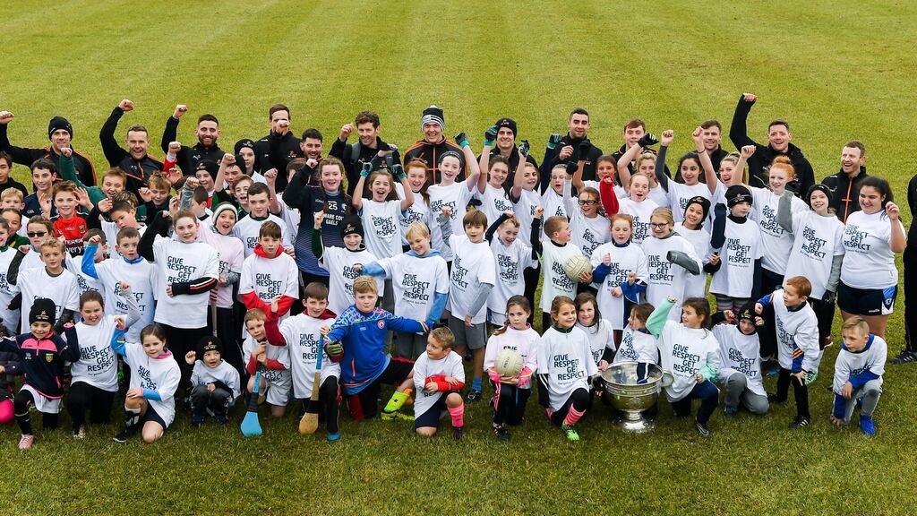 PwC All Star footballers with members of Philadelphia GAA Club and the Sam Maguire cup after a coaching session in Limerick Field, Pottstown, Philadelphia. Photograph: Ray McManus/Sportsfile