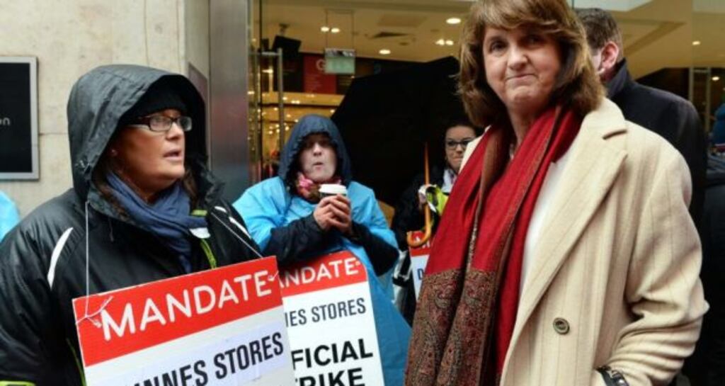 Tánaiste Joan Burton meets striking workers on the picket line at Dunnes Stores in Henry Street, Dublin. A new poll indicates small gains for the Labour Party. Photograph: Eric Luke/The Irish Times