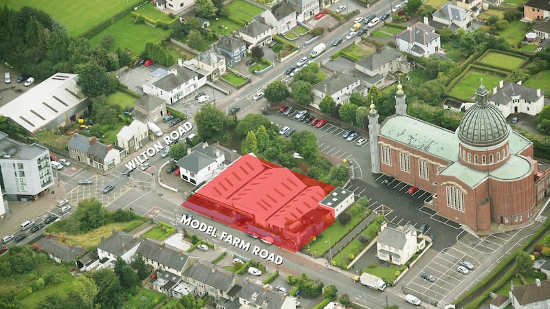 The former car showroom at Dennehy’s Cross has good road frontage on the Model Farm Road