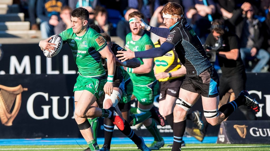 Connacht’s Tiernan O’Halloran makes a break during the game against Glasgow Warriors at Scotstoun. Photograph: Craig Watson/Inpho