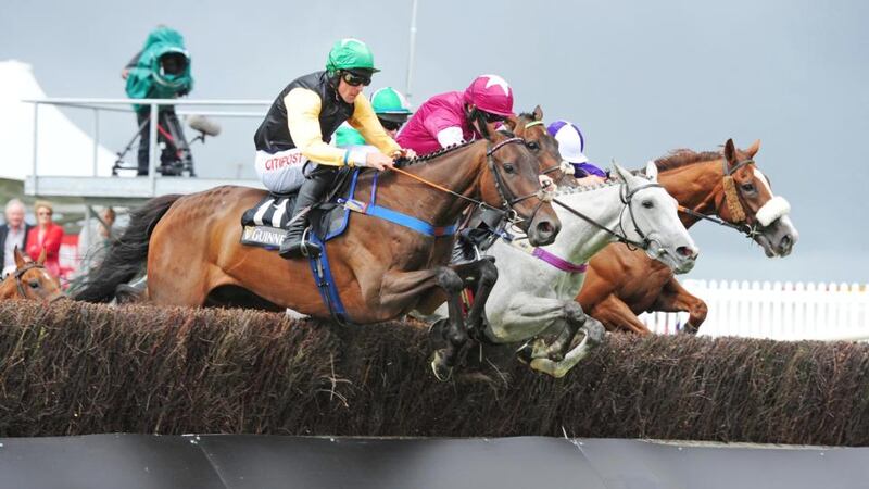 Shantou Flyer ridden by Davy Russell (left of picture) on the way to winning the Guinness Dublin Porter Beginners’ Chase during day four of the Galway Festival Ballybrit. Photograph: PA