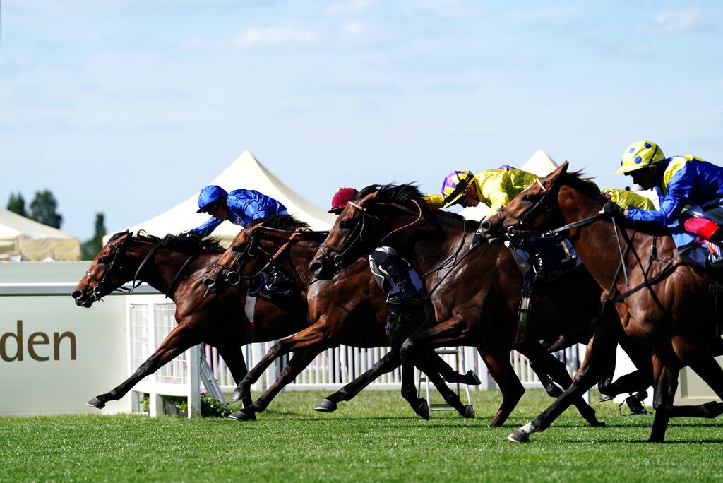 Coroebus ridden by William Buick (left, on the rail) takes the honours in the St James's Palace Stakes during Day One of Royal Ascot on Tuesday. Photograph: PA
