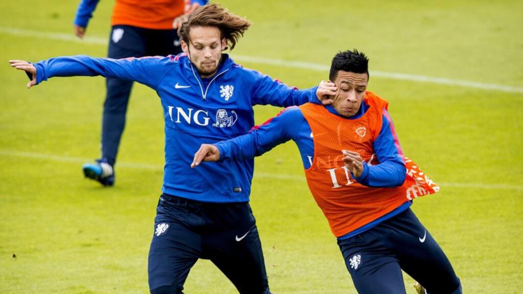 New Manchester United team-mates Daley Blind and Memphis Depay during a Dutch training session in Katwijk ahead of their Euro 2016 qualifier against Latvia in Riga. Photo: Koen Van Weel/AFP/Getty Images