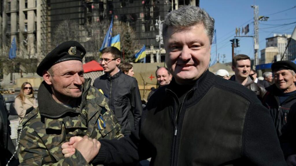 Petro Poroshenko greets people in Kiev’s Independence Square yesterday. Photograph: Reuters/Maks Levin