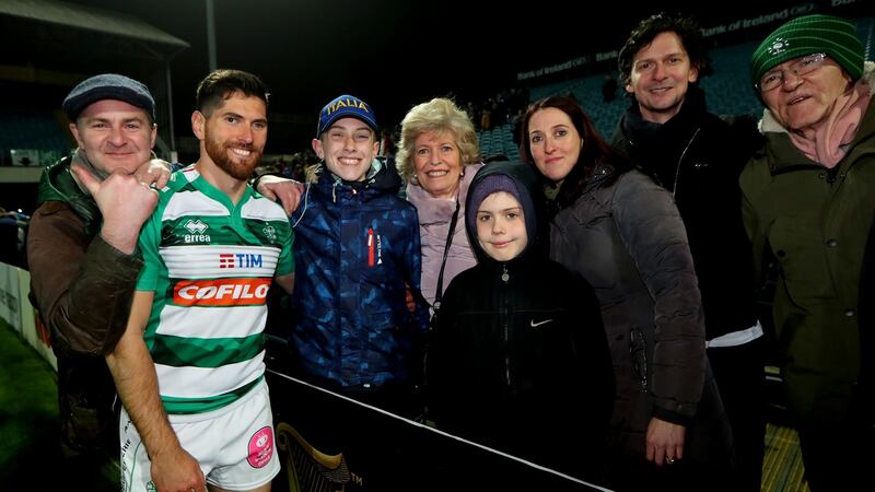 Benetton’s Ian McKinley celebrates with his family after Benetton Treviso’s win over Leinster at the RDS last April. Photograph: James Crombie/Inpho