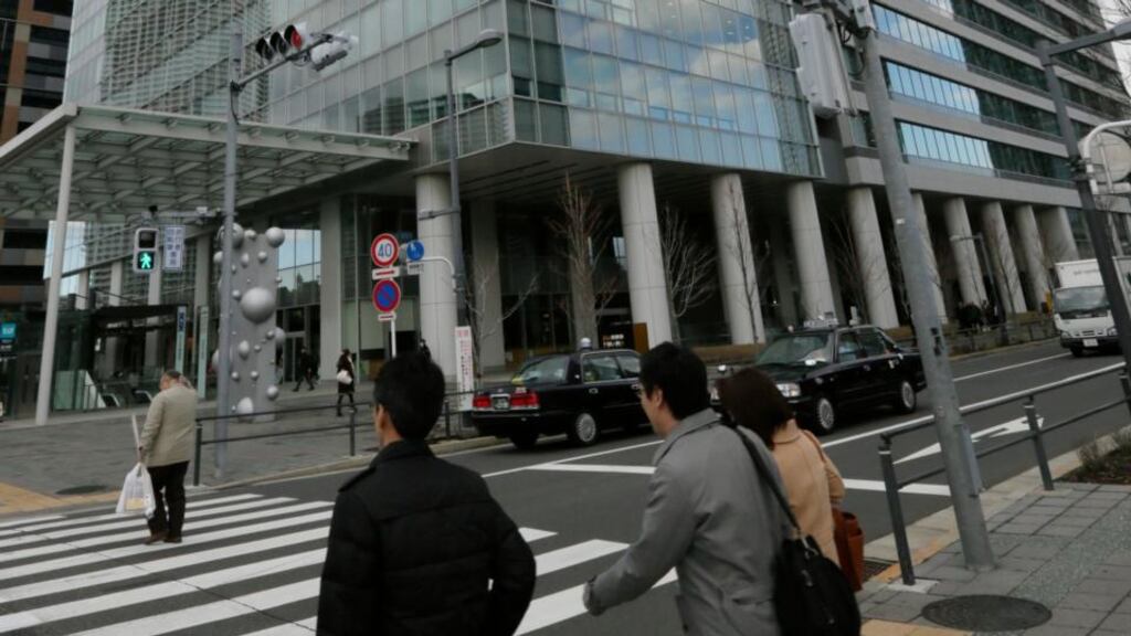 The headquarters of Maruha Nichiro Foods in Tokyo. A man was arrested yesterday on suspicion of contaminating food products which may have poisoned thousands of people. Photograph: Kimimasa Mayama/EPA