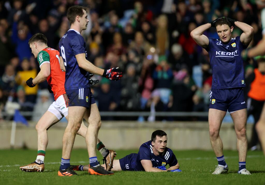 Mayo’s James Carr celebrates scoring his second goal as Kerry's Jack Barry, Paul Murphy and Tadhg Morley look on in dismay. File photograph: James Crombie/Inpho