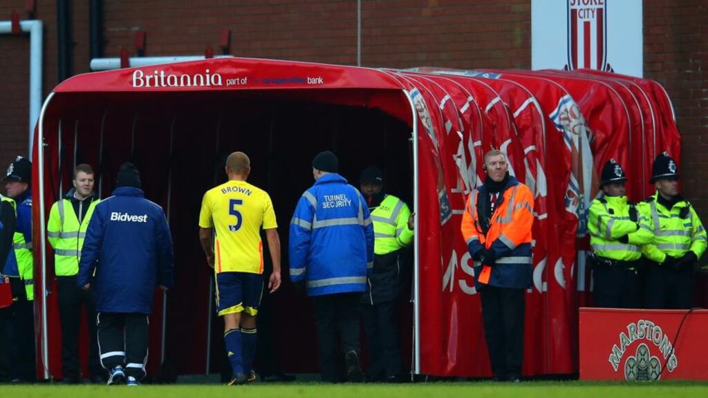 Wes Brown of Sunderland makes his way down the tunnel after being sent off for a challenge on Charlie Adam of Stoke City. Photograph: Julian Finney/Getty Images