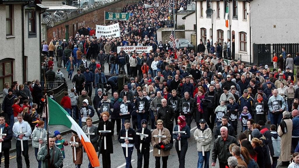 Bloody Sunday anniversary parade makes its way through the Bogside in Derry in 2002. Photograph: Trevor McBride