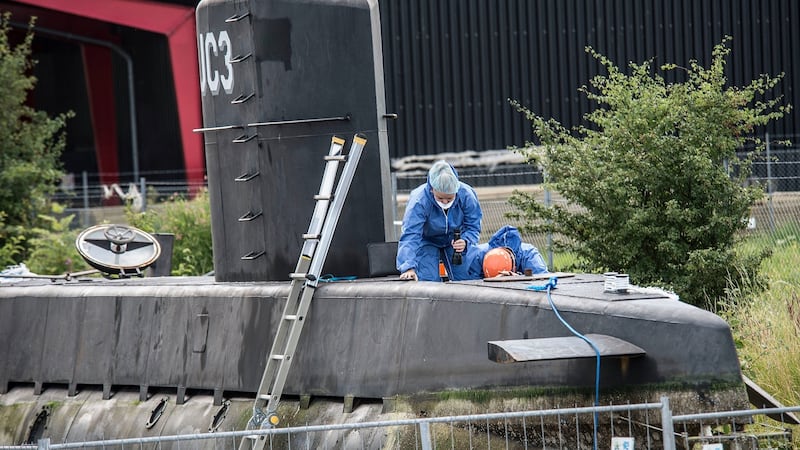 Police technicians on home-made submarine UC3 Nautilus in Copenhagen harbour, Denmark, conduct forensic investigations in connection with the death of journalist Kim Wall. Photograph: Mogens Flindt/Ritzau Foto/AP