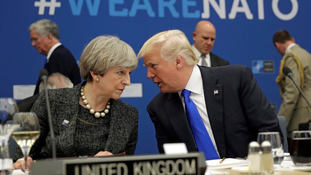 British prime minister Theresa May talks to US president Donald Trump: “Thank God for Donald, that he’s reminded us how important it is to be together as Europeans,” Dr Nathalie Tocci said at the Institute of International and European Affairs. Photograph: Matt Dunham/Reuters