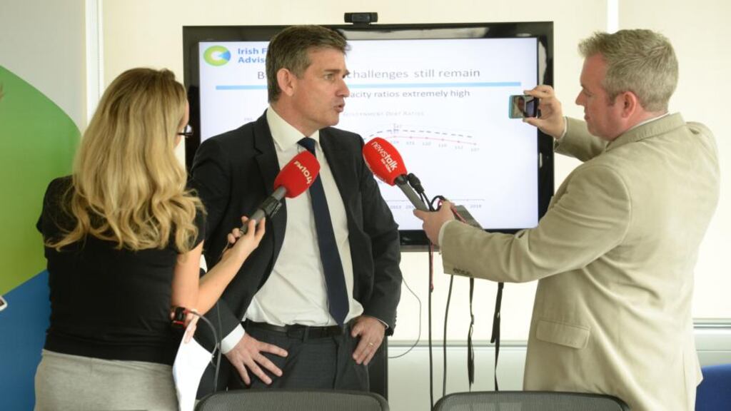 Professor John McHale, Chairman of , Irish Fiscal Advisory Council: stressed that significant uncertainties remain for the economy, primarily because of the high levels of private debt and the uneven pace of recovery abroad. Photograph: Dara Mac Dónaill / The Irish Times