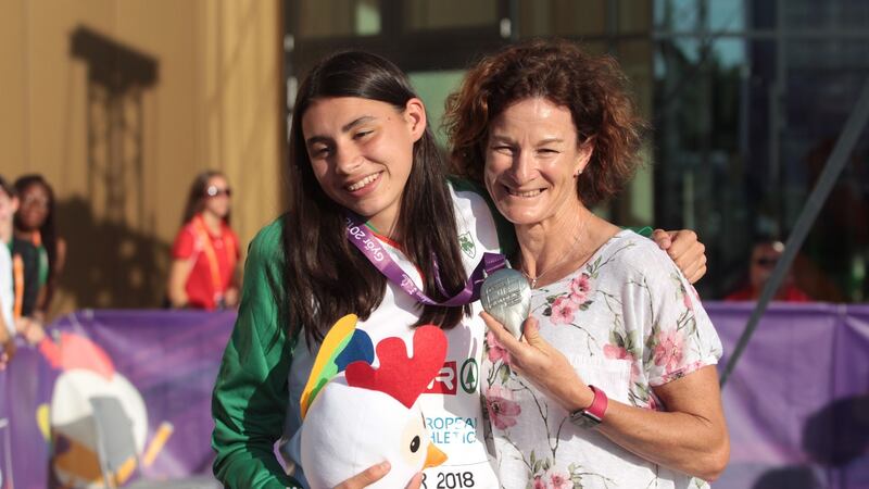 Ireland’s Sophie O’Sullivan is presented with her silver medal from the 800m  by her mother Sonia at the European Under-18 Championships in Gyor, Hungary. Photograph: Sasa Pahic Szabo/Inpho
