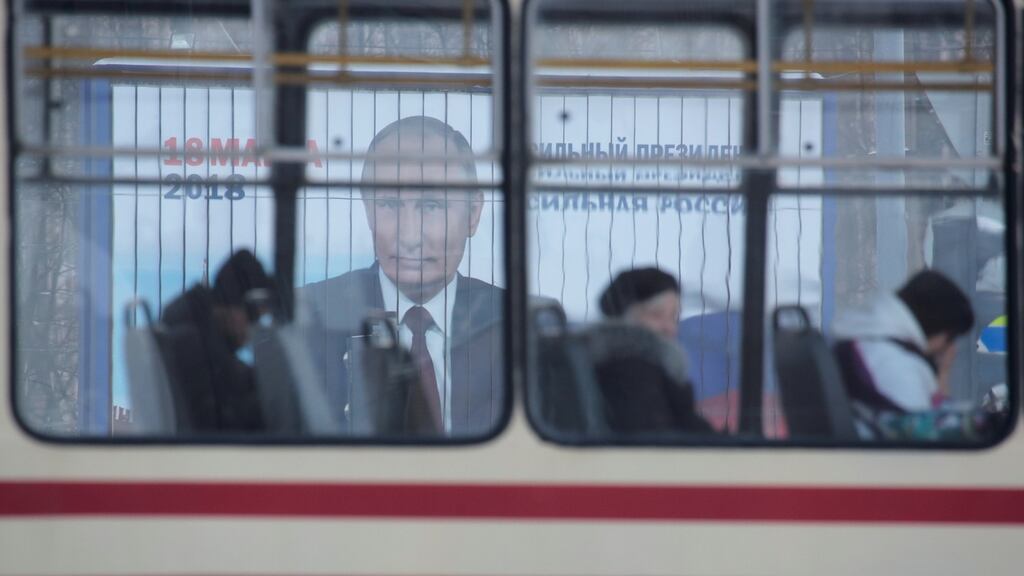 A hoarding in St Petersburg advertises Vladimir Putin ahead of the upcoming Russian presidential election. The European Parliament has lambasted a “Kremlin-orchestrated” campaign of “leaks, fake news, disinformation campaigns, and cyberattacks” targeting among others, the Brexit referendum. Photograph: Anton Vaganov/Reuters