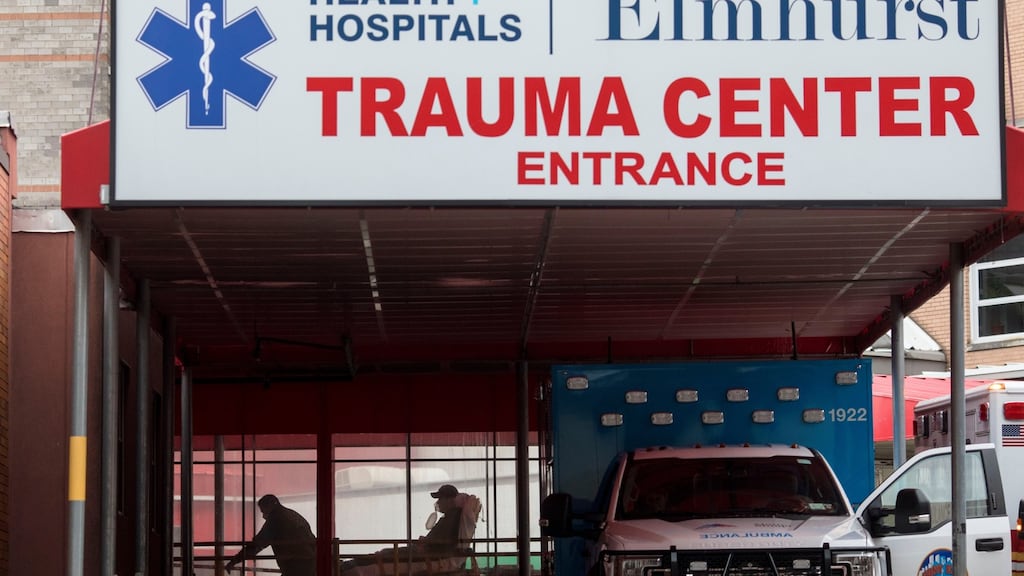A patient is brought to the emergency room at Elmhurst Hospital Center in Queens, New York. Photograph: The New York Times