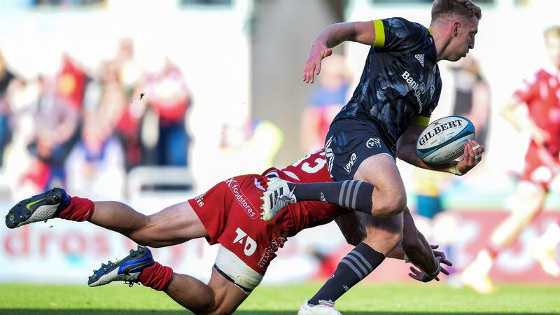 Munster’s Liam Coombes scores his sides fifth try during the United Rugby Championship match against the Scarlets at Parc y Scarlets. Photograph: Ryan Hiscott/Inpho