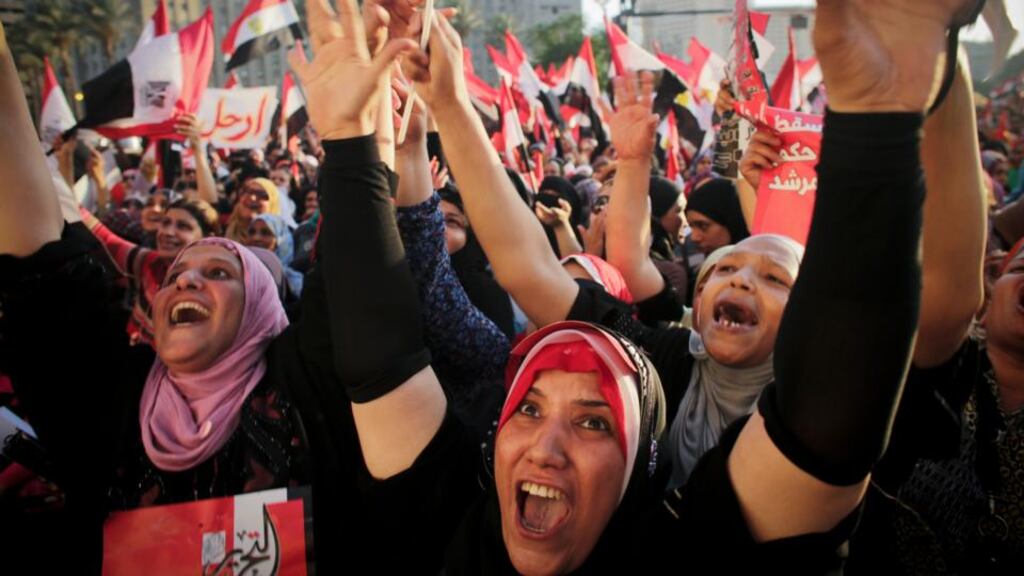 Protesters demonstrating against Mohamed Morsi in Cairo’s Tahrir Square in June. The question of whether his overthrow was a coup or a revolution is still not resolved. Photograph: New York Times service