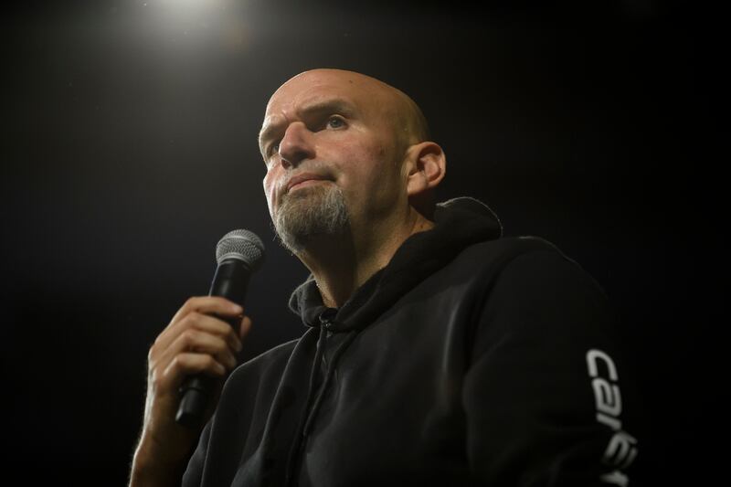 John Fetterman, the Democratic candidate for Senate in Pennsylvania, at a campaign rally in Erie. Dr Mehmet Oz, the Republican nominee for the Senate, has taunted Fetterman about his recovery from a stroke. Photograph: Jeff Swensen/New York Times