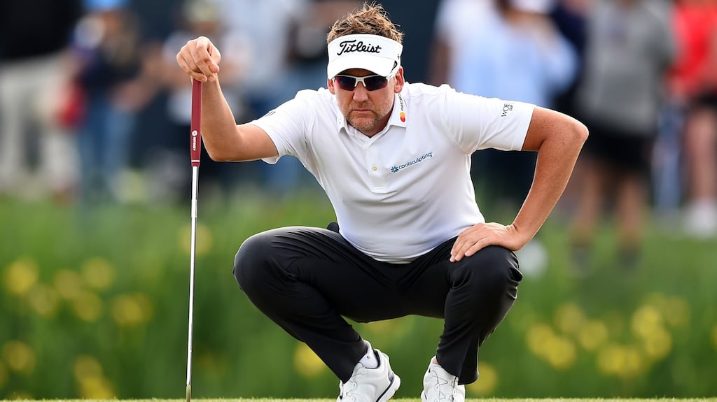 England’s Ian Poulter lines up a putt on the 18th green during his first playoff hole at the Houston Open in Texas. Photograph: Josh Hedges/Getty Images