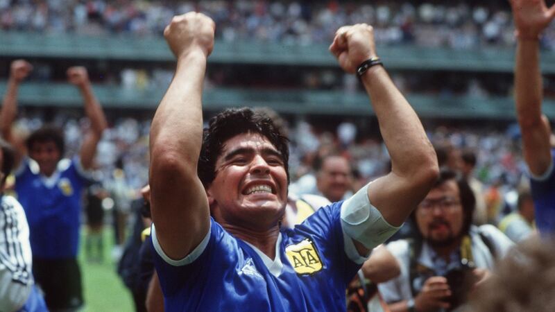 Diego Maradona celebrates at the end of the match. Photograph: Billy Stickland/Inpho