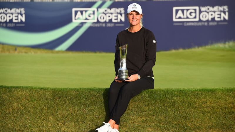 Sweden’s Anna Nordqvist poses with the trophy after her victory in the Women’s British Open. Photograph: Andy Buchanan/AFP via Getty Images