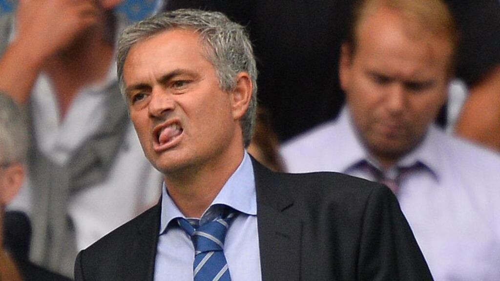 Chelsea manager Jose Mourinho reacts during their English Premier League season opener against Hull.