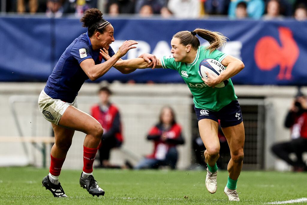 Ireland's Béibhinn Parsons sees off a tackle from France's Kelly Arbey in Ireland's opening Six Nations match in Le Mans last weekend. Photograph: Ben Brady/Inpho