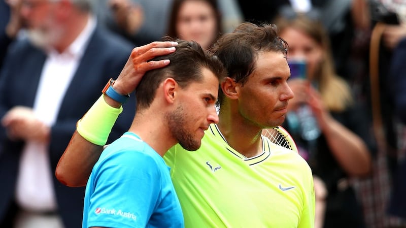 Rafael Nadal consoles Dominic Thiem after his French Open final victory at Roland Garros. Photograph: Julian Finney/Getty