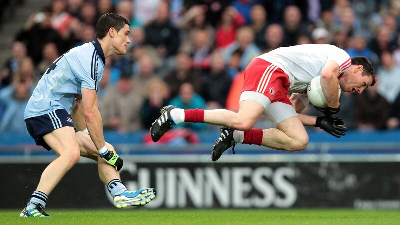 Diarmuid Connolly and Tyrone’s Conor Gormley during the 2011 quarter-final. Connolly kicked seven points from play in a five-star display as Dublin prevailed 0-22 to 0-15. Photograph: Cathal Noonan/Inpho