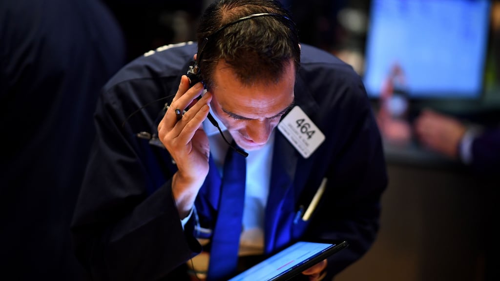 A trader at New York Stock Exchange. The benchmark S&P 500 swung into positive territory after falling as much as 3.3% earlier in the session. Photograph: Getty Images