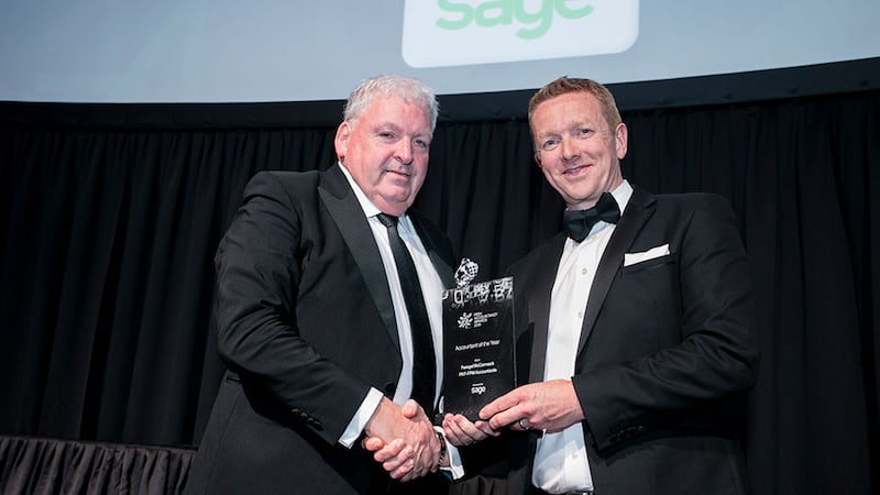 Barry Murphy, Managing Director, Sage, presents the Accountant of the Year award to Feargal McCormack, PKF-FPM Accountants.