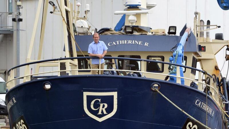 Cara Rawdon aboard Catherine R: “It’s a 24-hour job, seven days a week, when we’re out at sea. The bell rings every five hours to pull the nets in.” Photograph: Phil Gamble