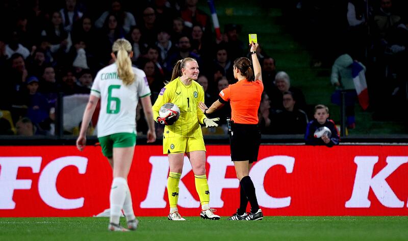 Ireland goalkeeper Courtney Brosnan is yellow carded by referee Maria Caputi for time wasting against France. Photograph: Ryan Byrne/Inpho