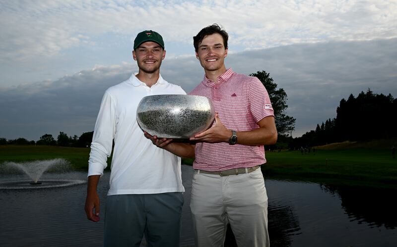 Rasmus Hojgaard (right) poses with his brother Nicolai after his win in the Made in HimmerLand tournament at Himmerland Golf & Spa Resort in Denmark in 2023. Photograph: Octavio Passos/Getty Images