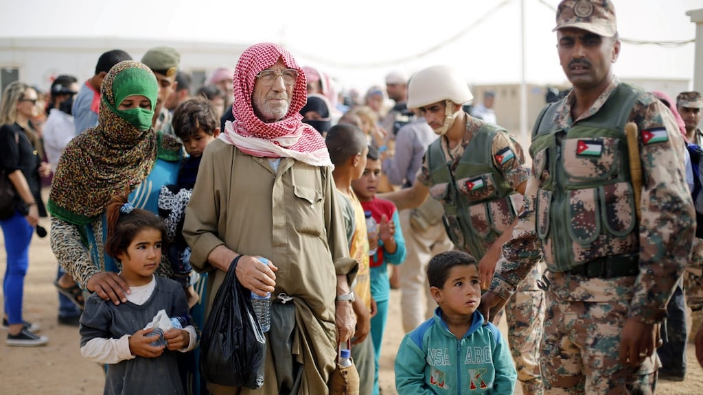 Syrian refugees after crossing into Jordan territory with their families in 2015. Photograph: Muhammad Hamed/File Photo/Reuters