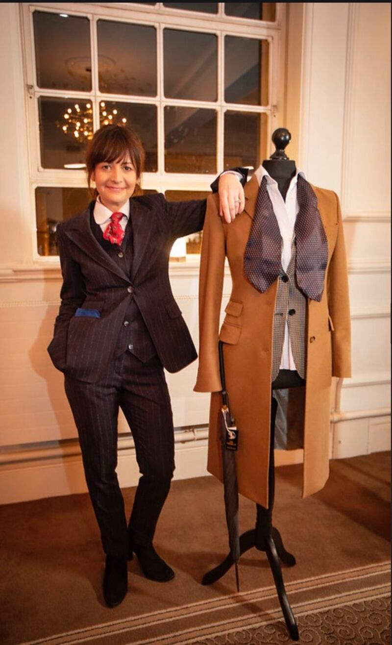 Patricia Grogan from The Cut in one of her sharply tailored suits