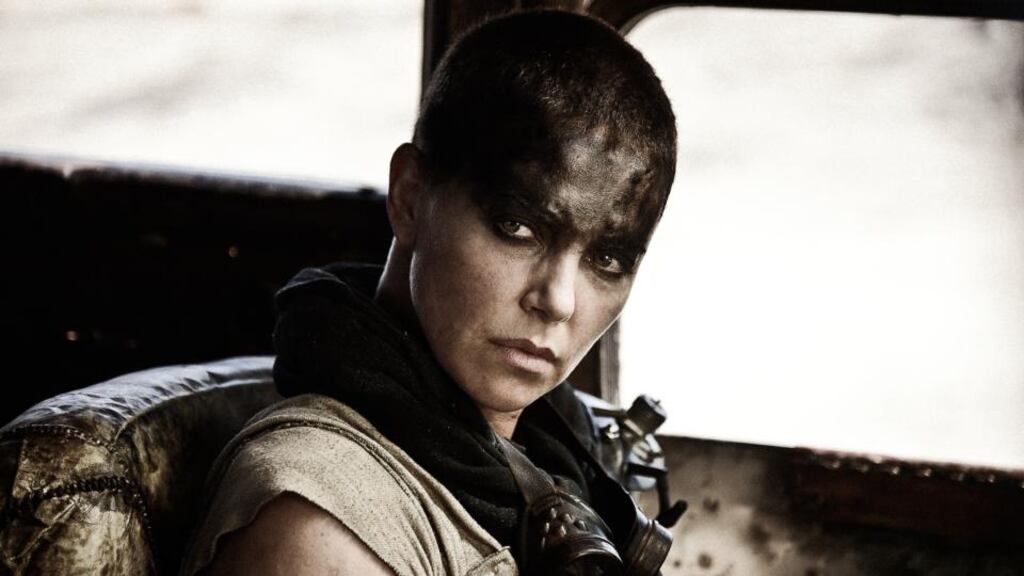 ‘I almost felt myself sinking lower in my cinema seat, as the dystopian-bikini-clad model-actresses billowed in the wind.’ Above, Charlize Theron in ‘Mad Max: Fury Road’.