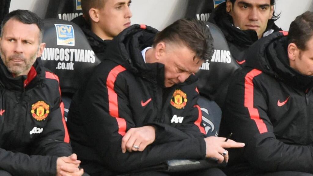 Swansea City are to deal with one of their directors, John van Zenden, who labelled Manchester United boss Louis van Gaal an ‘arrogant bastard’. (Photograph: Reuters / Rebecca Naden)