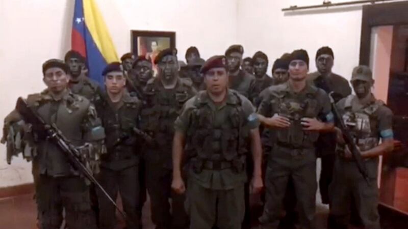 A TV grab taken from a video posted on social media of dissident military officials attempting an uprising at a barracks in Venezuela. Photograph: AFP/Getty Images