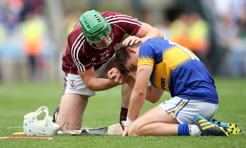 Galway's Greg Lally consoles Tipperary's Niall O'Meara after Galway's one-point win in the 2015 All-Ireland semi-final at Croke Park. Three years in a row just one point separated the teams in semi-finals. Photograph: James Crombie/Inpho