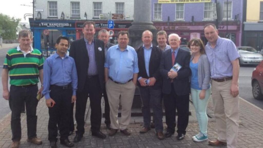 Former taoiseach Brian Cowen (centre, blue shirt) on the campaign trail with MEP Pat ‘the Cope’ Gallagher (third right) in Offaly. Photograph: Pat ‘The Cope’ Gallagher/ via Facebook