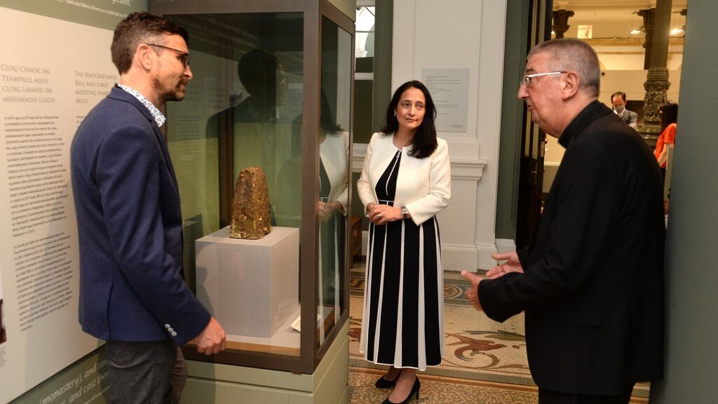 From left: the curator of Glendalough: Power, Prayer and Pilgrimage Matthew Seaver. with Minister for Culture Catherine Martin and Archbishop of Dublin and Primate of Ireland Diarmuid Martin. Photograph: Dara Mac Dónaill