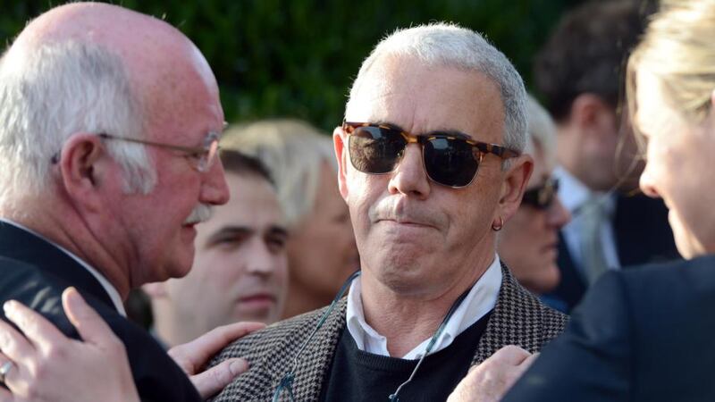 Publisher Peter Fallon (left) and poet Theo Dorgan at the removal of Seamus Heaney at the Church of the Sacred Heart, Donnybrook, Dublin, yesterday evening. Photograph: Eric Luke