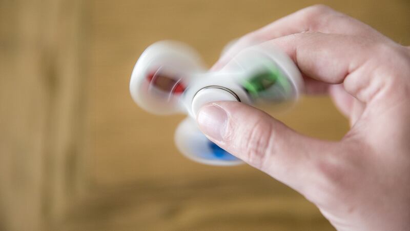 Fidget spinner: The must-have office toy for 2017