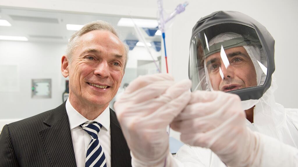 Minister for Enterprise Richard Bruton with Gary Corbett of Medtronic: The medical device giant manufactures drug-coated balloons for artery disease. Photograph: Andrew Downes